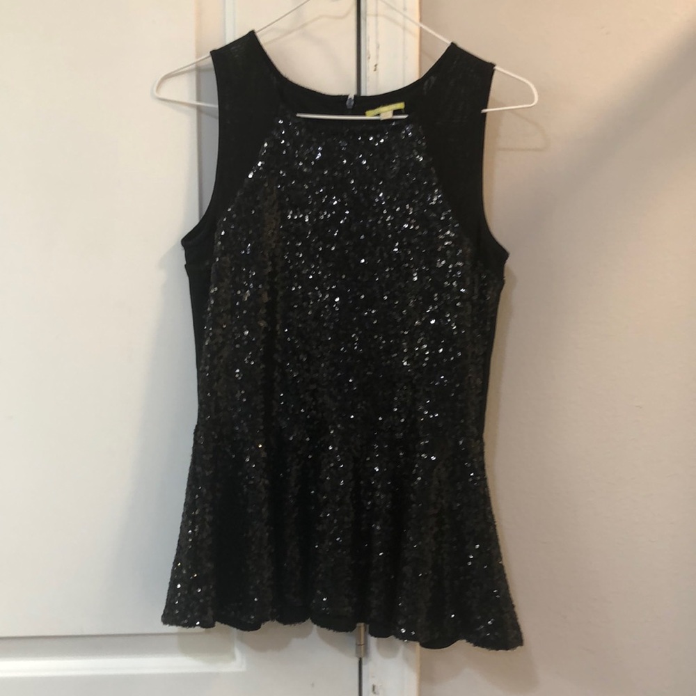 Sleeveless dressy top with sequins. Size small.